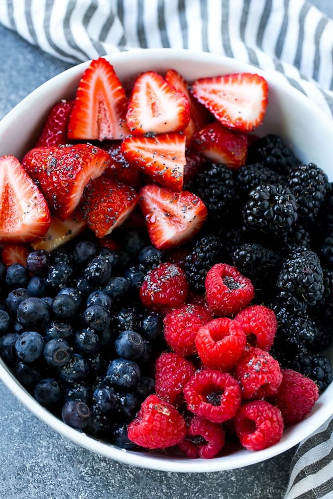 Berry Fruit Salad Recipe | Berry Salad | Summer Berry Salad | Fruit Salad Recipe #berries #fruitsalad #bajap A bowl of blueberries, raspberries, blackberries and strawberries topped with poppy seed dressing.
