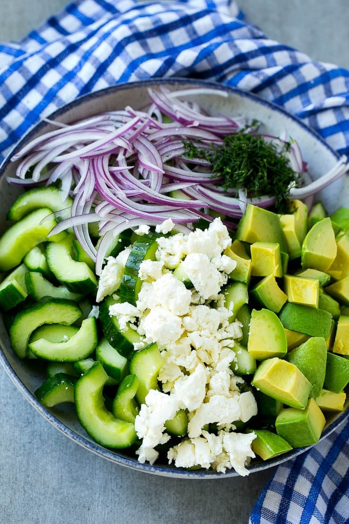 Cucumber Feta Salad Recipe | Cucumber Salad | Feta Cheese Salad | Summer Salad #salad #cucumber #bajap Salad ingredients in a bowl.
