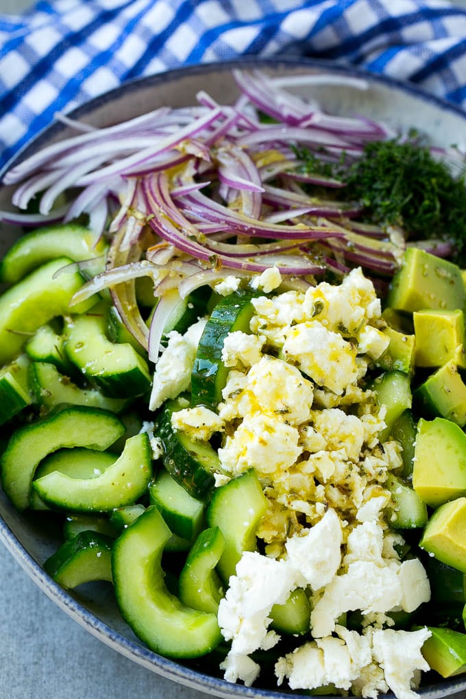 Cucumber Feta Salad Recipe | Cucumber Salad | Feta Cheese Salad | Summer Salad #salad #cucumber #bajap Veggies and cheese topped with Greek dressing.