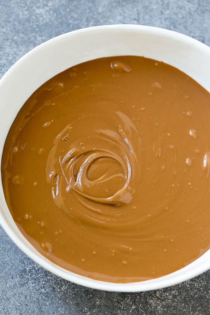 Haystack Cookies Recipe | No Bake Cookies | Chow Mein Noodle Cookies #nobakecookies #cookies #recipe #chocolate #bajap A bowl of melted milk chocolate chips and butterscotch chips.