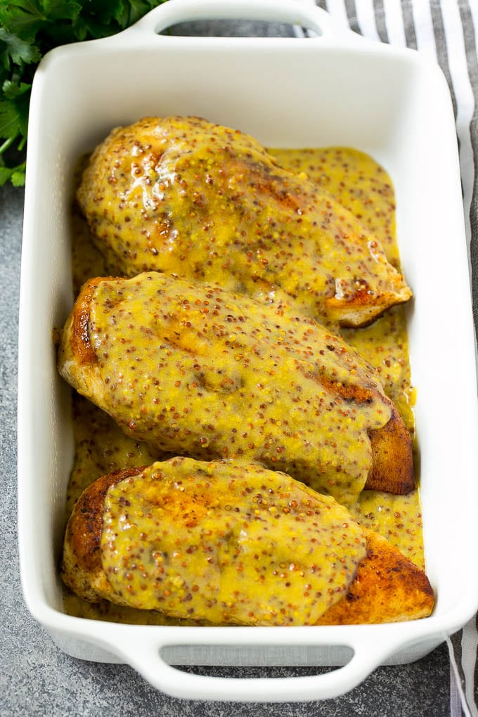 Honey Mustard Chicken Recipe | Baked Chicken Recipe | Easy Chicken Recipe #chicken #dinner #bajap Chicken breasts in a baking dish topped with sauce.