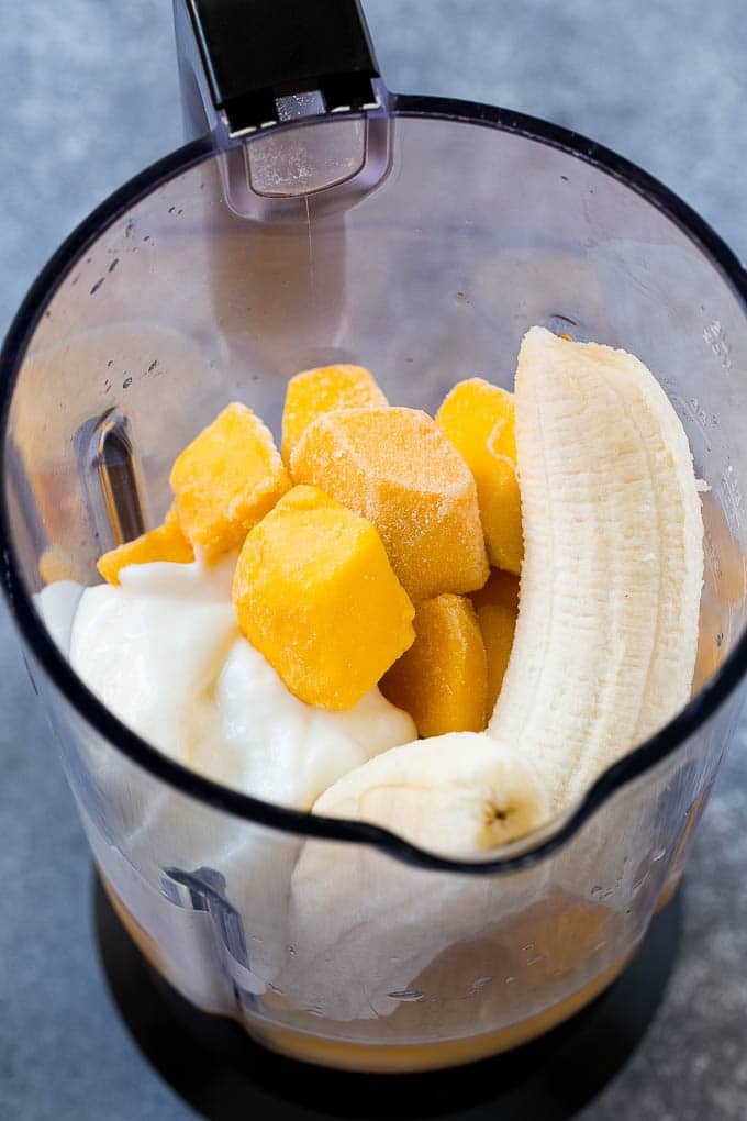Mango Smoothie Recipe | Mango Recipe | Healthy Smoothie #mango #smoothie #drink #bajap Fruit, yogurt and juice in a blender.
