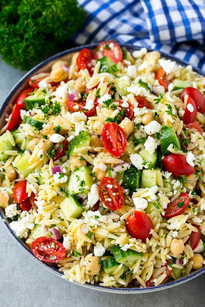 Orzo Salad Recipe | Orzo Pasta Salad | Greek Orzo Salad | Mediterranean Orzo Salad #pastasalad #orzo #greekfood #salad #bajap Greek orzo salad with pasta, cucumbers, tomatoes and feta cheese.