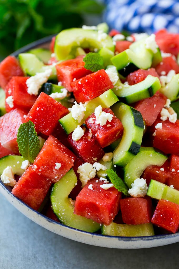 Watermelon Salad Recipe | Watermelon Feta Salad | Watermelon Cucumber Salad #watermelon #cucumber #salad #bajap Watermelon salad with cucumbers, feta cheese and mint in a serving bowl.