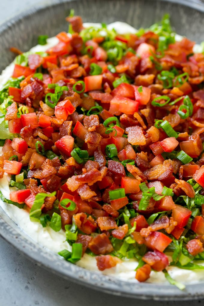 BLT Dip Recipe | Bacon Dip Recipe | Ranch Dip #dip #ranch #bacon #lettuce #tomato #appetizer #bajap BLT dip with a creamy ranch base, lettuce, tomatoes and bacon.