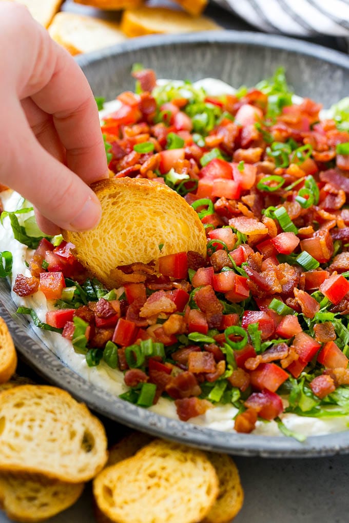 BLT Dip Recipe | Bacon Dip Recipe | Ranch Dip #dip #ranch #bacon #lettuce #tomato #appetizer #bajap BLT dip with bacon, lettuce, tomato and green onions over a creamy ranch dip.