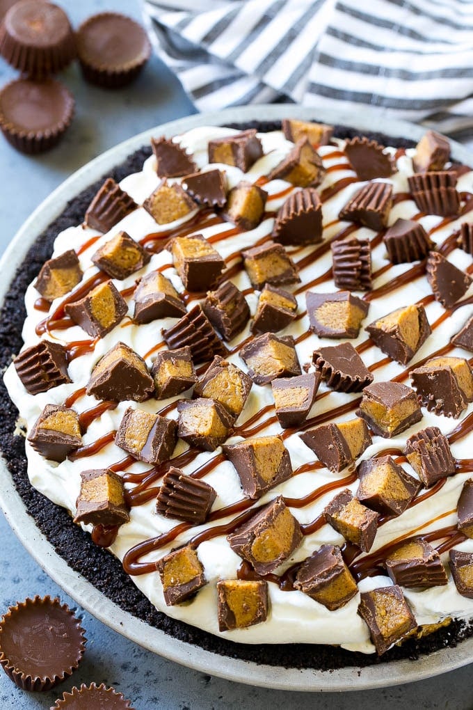 Chocolate Peanut Butter Pie Recipe | Peanut Butter Cup Pie | Peanut Butter Pie | No Bake Pie #chocolate #peanutbutter #pie #nobake #dessert #bajap A peanut butter pie with cookie crust, peanut butter filling, whipped cream topping and chopped peanut butter cups.