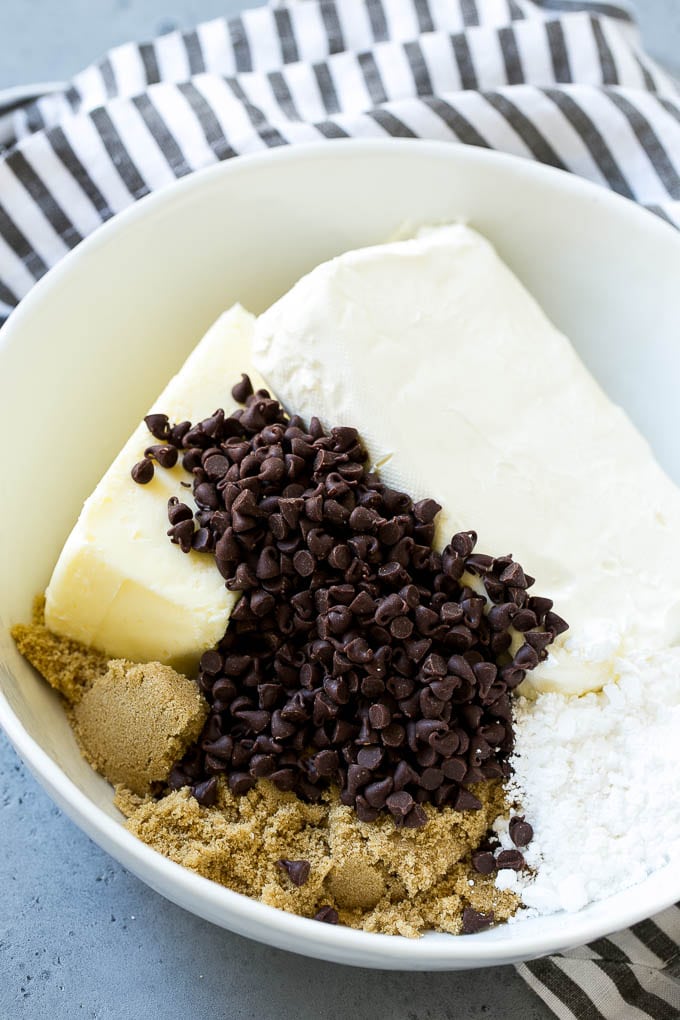 Cookie Dough Dip Recipe | Edible Cookie Dough | Chocolate Chip Cookie Dip #cookies #dip #cookiedough #dessert #snack #bajap Ingredients including butter, cream cheese, chocolate chips and brown sugar.