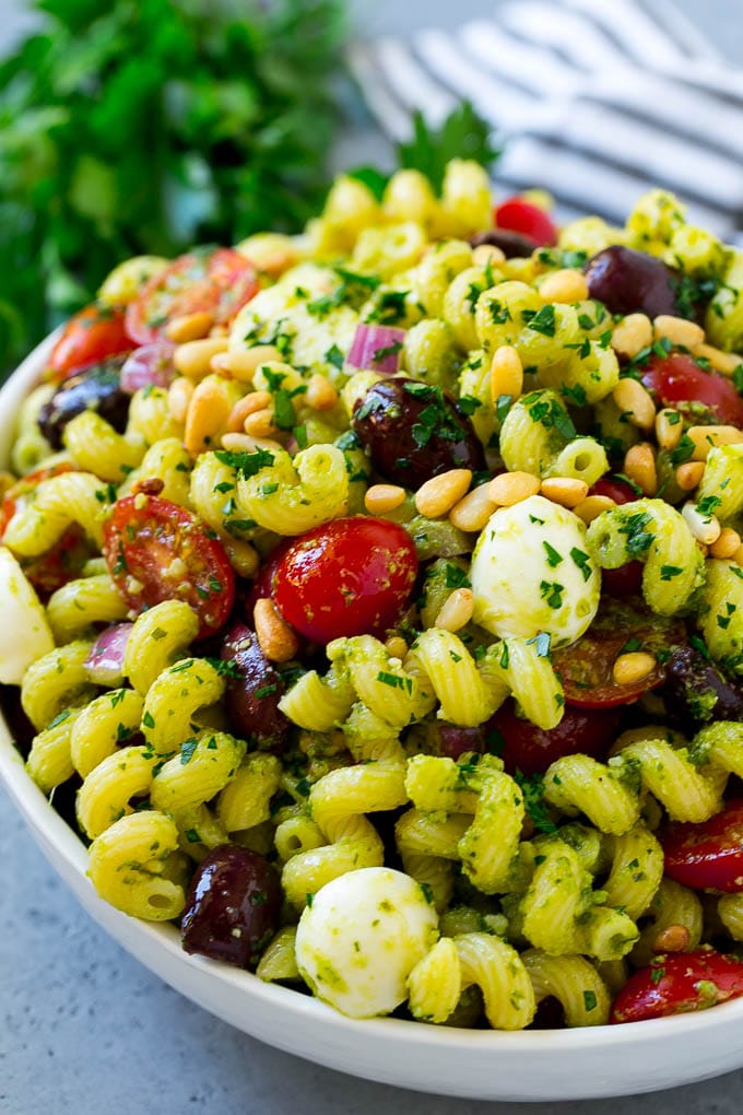 Pesto Pasta Salad | Italian Pasta Salad | Easy Pasta Salad #pasta #salad #pesto #olives #tomatoes #bajap Pesto pasta salad with tomatoes, olive and fresh mozzarella.