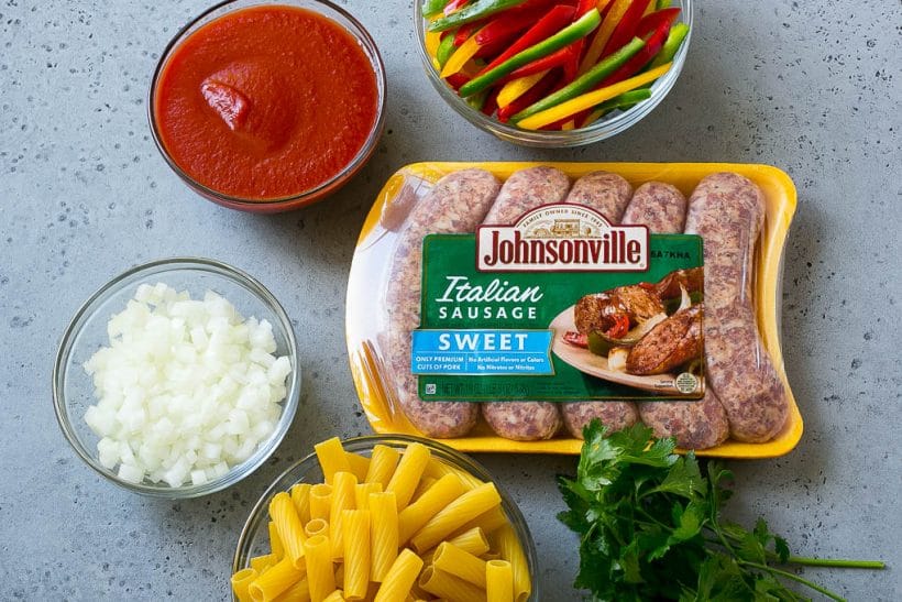 Sausage and Pepper Pasta Recipe | Italian Sausage Recipe | Sausage and Peppers | Easy Pasta #pasta #sausage #peppers #dinner #bajap Ingredients like pork, tomato sauce onion and rigatoni.