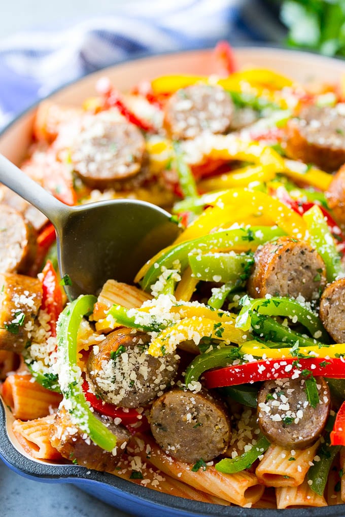 Sausage and Pepper Pasta Recipe | Italian Sausage Recipe | Sausage and Peppers | Easy Pasta #pasta #sausage #peppers #dinner #bajap Sausage and pepper pasta with Italian sausage, topped with parmesan cheese.
