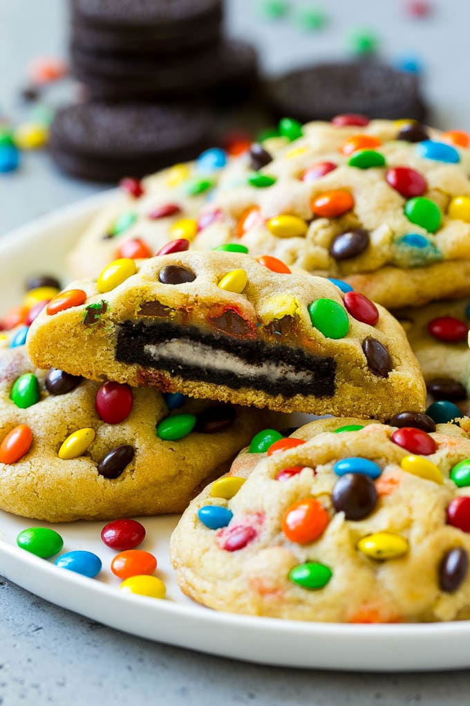 Oreo Stuffed Cookies Recipe | M&M's cookies | Stuffed Cookies #cookies #chocolate #oreos #dessert #baking #bajap A plate of Oreo stuffed cookies topped with miniature M&M's.