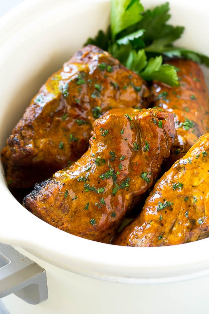 Slow Cooker Pork Tenderloin Recipe | Crock Pot Pork Tenderloin | Easy Pork Tenderloin #slowcooker #crockpot #pork #dinner #bajap Slow cooker pork tenderloins coated with sauce, inside a crock pot.
