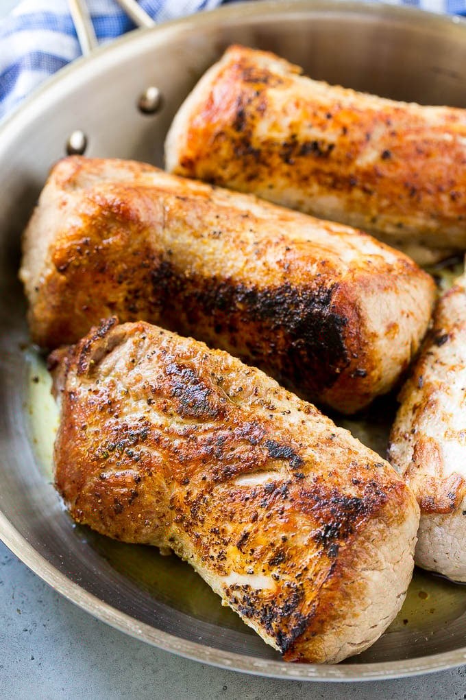 Slow Cooker Pork Tenderloin Recipe | Crock Pot Pork Tenderloin | Easy Pork Tenderloin #slowcooker #crockpot #pork #dinner #bajap Seared pork tenderloin in a skillet.