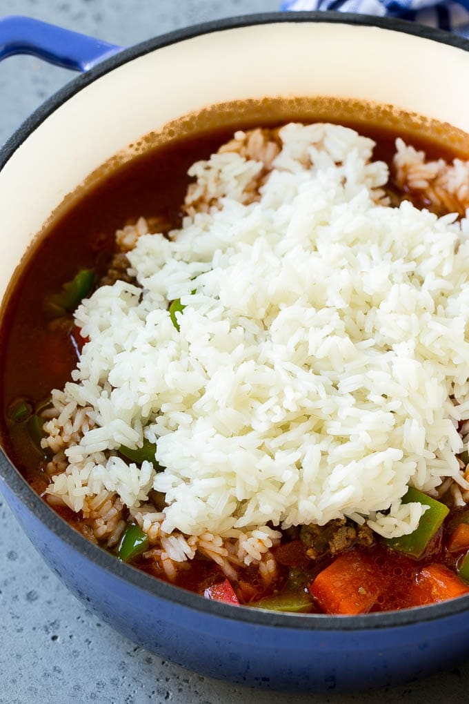 Stuffed Pepper Soup Recipe | Beef and Rice Soup | Stuffed Peppers #peppers #soup #beef #rice #dinner #bajap Cooked rice being on top of soup.