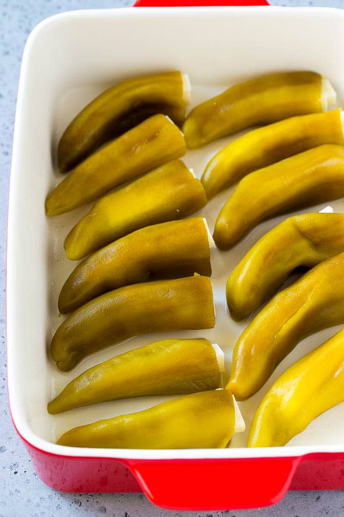 Chile Relleno Casserole Recipe | Baked Chile Rellenos | Mexican Casserole #casserole #chiles #mexican #cheese #dinner #bajap Cheese stuffed chiles in a baking dish.