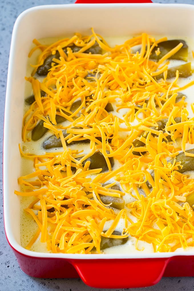 Chile Relleno Casserole Recipe | Baked Chile Rellenos | Mexican Casserole #casserole #chiles #mexican #cheese #dinner #bajap Green chiles in an egg batter topped with shredded cheddar cheese.