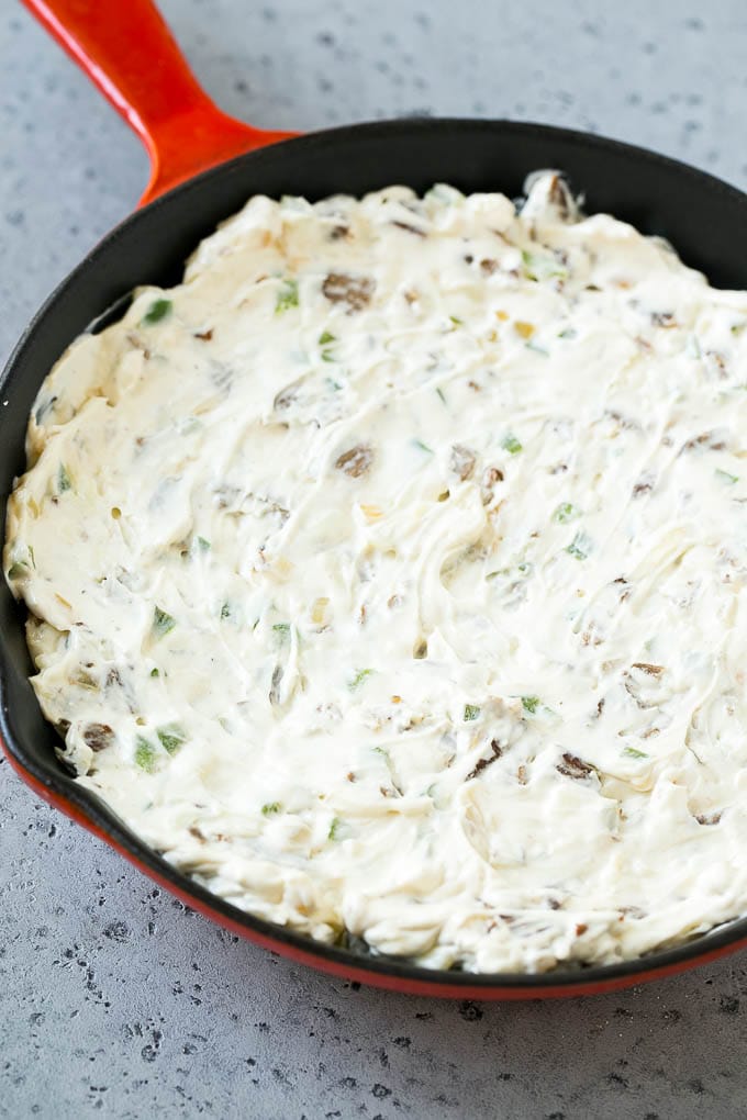 Philly Cheesesteak Dip Recipe | Cheesy Dip | Baked Cheese Dip #steak #dip #appetizer #cheese #bajap Steak, peppers and onions in a skillet, mixed with cream cheese.