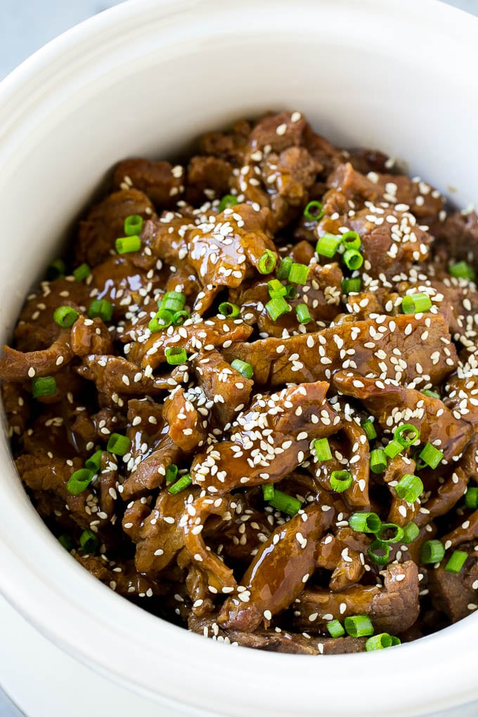 Slow Cooker Korean Beef Recipe | Korean Beef | Flank Steak Recipe #dinner #beef #slowcooker #crockpot #asian #bajap Slow cooker Korean beef with flank steak slices in a sweet and savory sauce, all inside a crock pot.