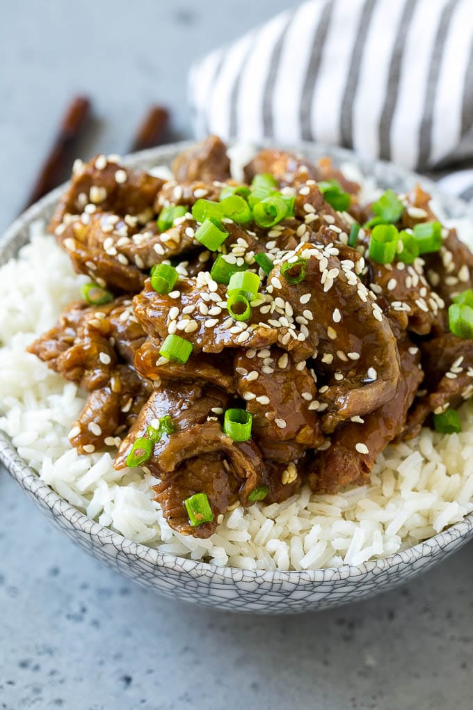Slow Cooker Korean Beef Recipe | Korean Beef | Flank Steak Recipe #dinner #beef #slowcooker #crockpot #asian #bajap Slow cooker Korean beef served over steamed rice.