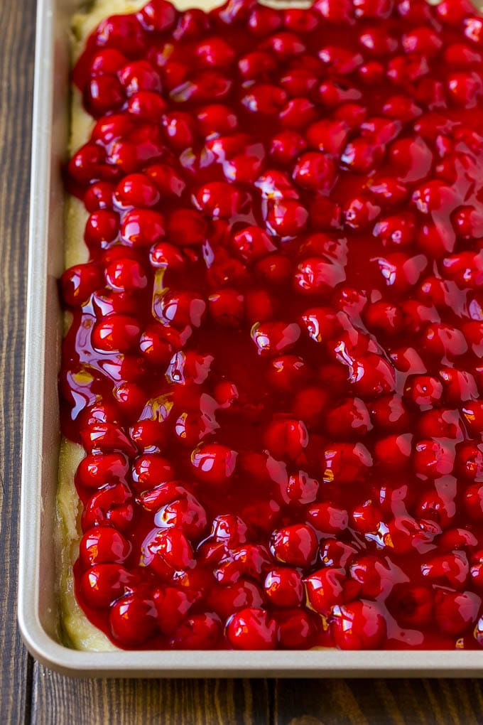 Cherry Bars Recipe | Cherry Pie Bars | Cherry Cookies | Bar Cookies #cookies #bars #cherry #baking #dessert #sweets #bajap Filling spread over a cookie crust.