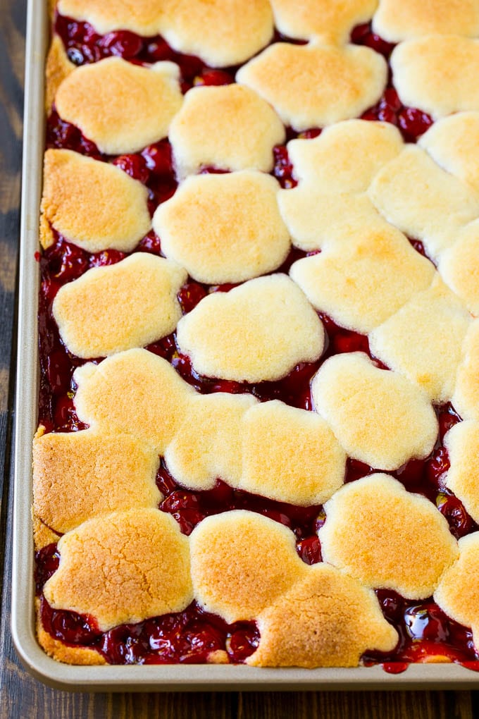 Cherry Bars Recipe | Cherry Pie Bars | Cherry Cookies | Bar Cookies #cookies #bars #cherry #baking #dessert #sweets #bajap A pan of baked dough and filling.