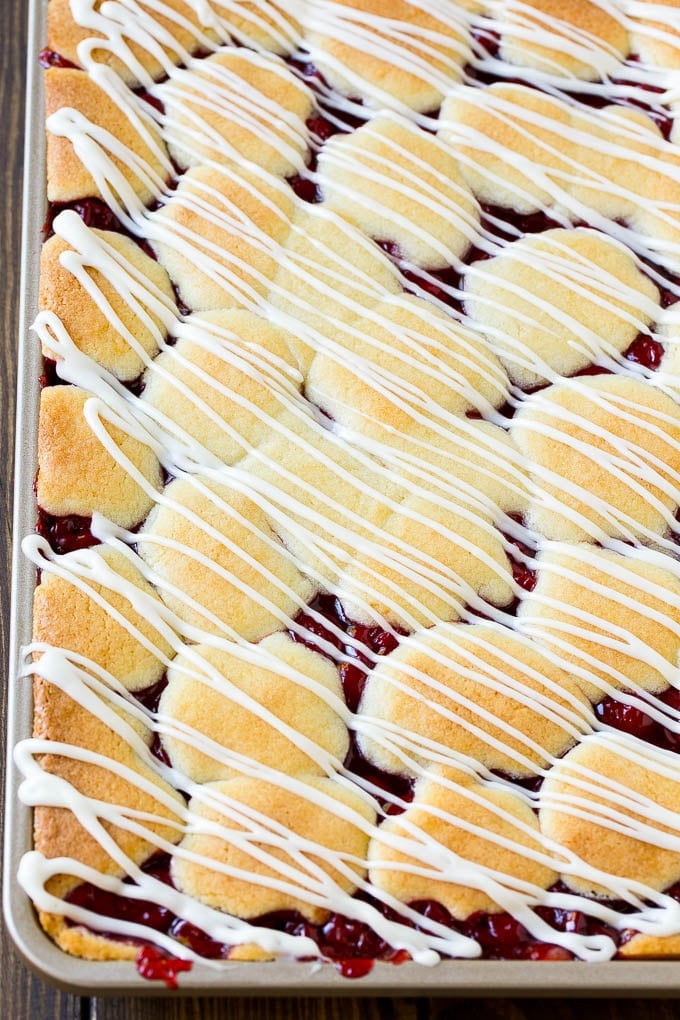 Cherry Bars Recipe | Cherry Pie Bars | Cherry Cookies | Bar Cookies #cookies #bars #cherry #baking #dessert #sweets #bajap Cherry bars topped with vanilla glaze.