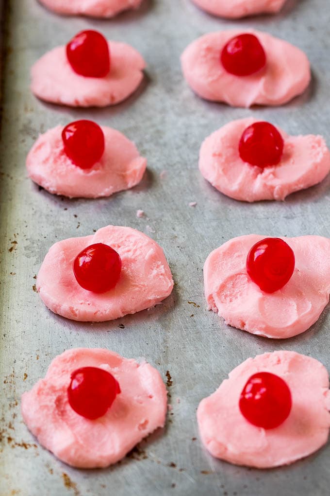 Chocolate Covered Cherries Recipe | Cherry Cordials | Cherry Candy #chocolate #candy #dessert #cherry #sweets #bajap Discs of cherry filling with a maraschino cherry on top.