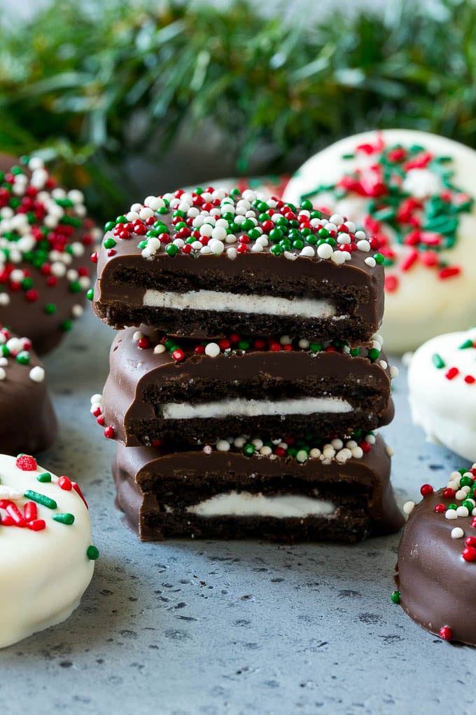 Chocolate Covered Oreos Recipe | Oreo Cookies | Chocolate Dipped Oreos #oreo #cookies #chocolate #sprinkles #dessert #bajap A stack of chocolate covered Oreos.