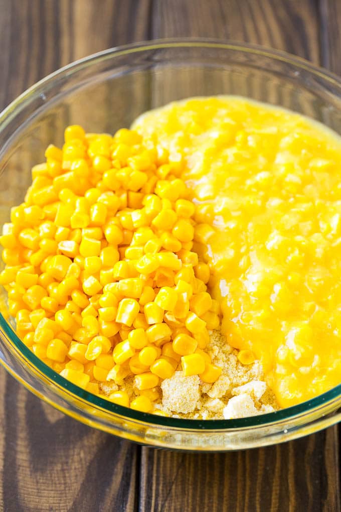 Corn Pudding Recipe | Corn Casserole | Corn Side Dish #corn #pudding #casserole #sidedish #thanksgiving #dinner #bajap Corn kernels, creamed corn and cornbread mix in a bowl.