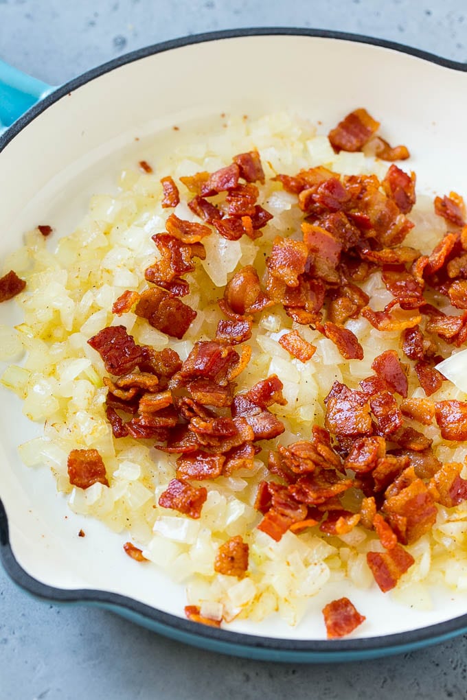 Fried Cabbage Recipe | Cabbage with Bacon | Cabbage Side Dish #cabbage #bacon #sidedish #lowcarb #keto #bajap Sauteed bacon and onions in a skillet.