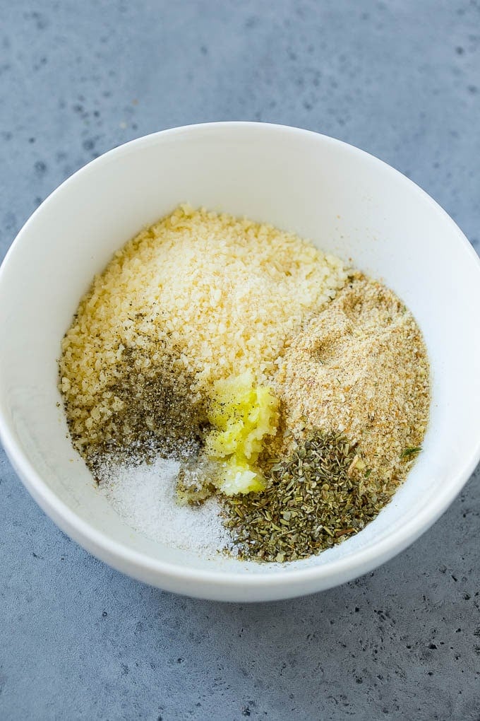 Italian Chicken Recipe | Sheet Pan Chicken | Baked Chicken #chicken #potatoes #dinner #bajap A mixture of breadcrumbs, parmesan cheese, garlic and herbs in a bowl.