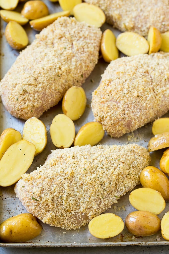 Italian Chicken Recipe | Sheet Pan Chicken | Baked Chicken #chicken #potatoes #dinner #bajap Breaded Italian chicken and potatoes on a sheet pan.