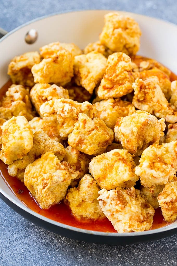 Sweet Chili Chicken Recipe | Thai Chicken | Asian Chicken #chicken #thaifood #chili #dinner #bajap Crispy chicken breast pieces with sweet chili sauce in a pan.