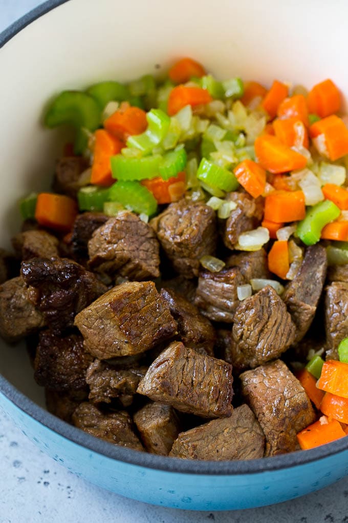 Beef Barley Soup Recipe | Beef Soup | Barley Soup #soup #beef #dinner #vegetables #bajap #comfortfood Stew meat, carrots, onions and celery in a large pot.