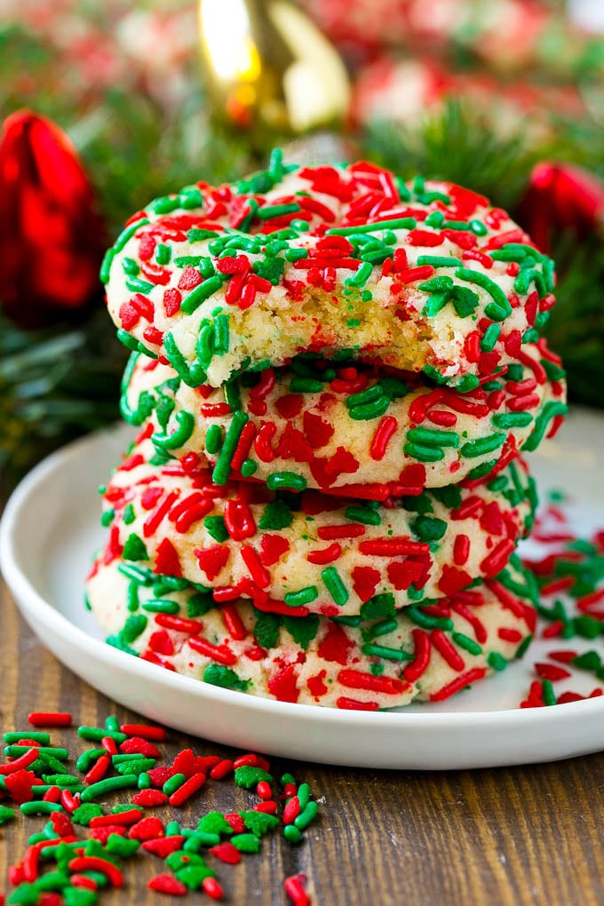 Cake Mix Cookies Recipe | Sprinkle Cookies | Christmas Cookies #cookies #christmas #sprinkles #dessert #baking #bajap A stack of cake mix cookies made with white cake mix and festive sprinkles.