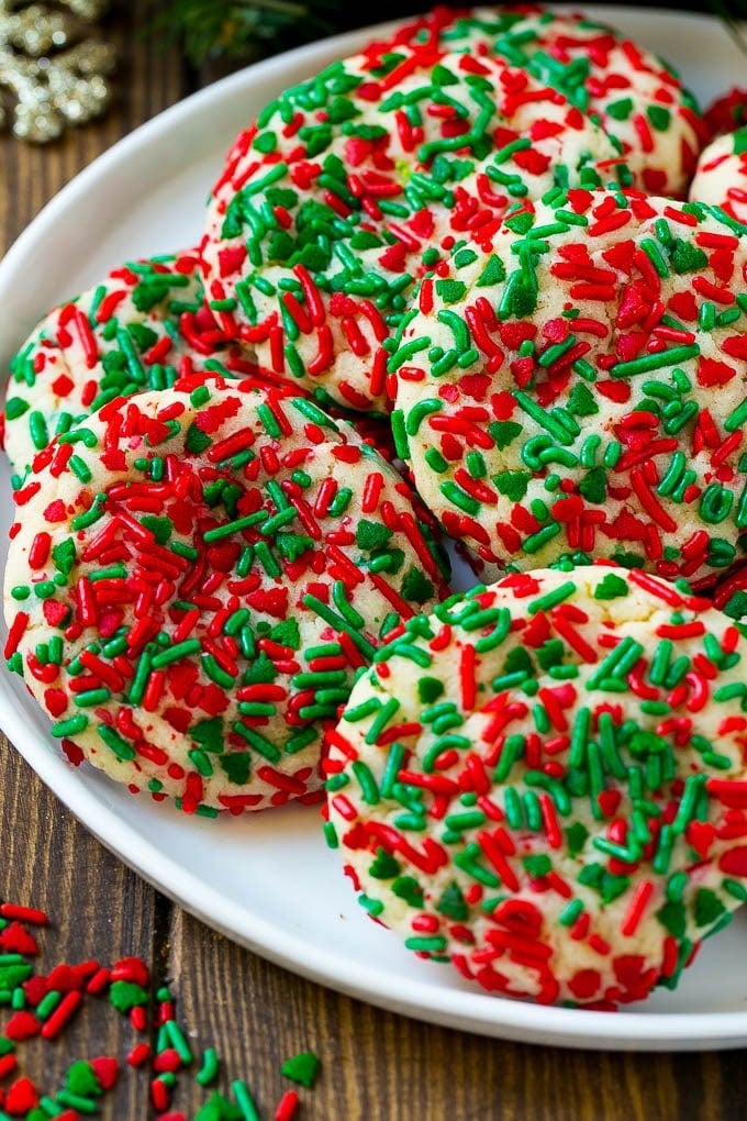Cake Mix Cookies Recipe | Sprinkle Cookies | Christmas Cookies #cookies #christmas #sprinkles #dessert #baking #bajap Cake mix cookies with sprinkles on a serving plate.
