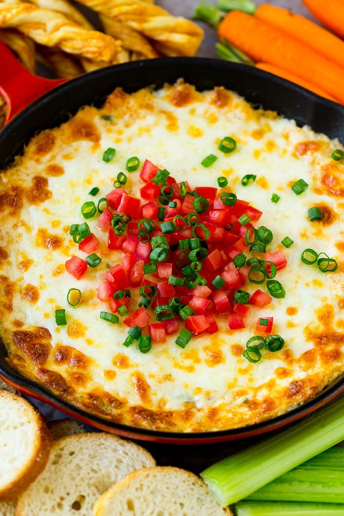 Crab Dip Recipe | Hot Crab Dip | Seafood Dip #dip #crab #seafood #appetizer #bajap #cheese Hot crab dip in a skillet topped with tomatoes and green onions.