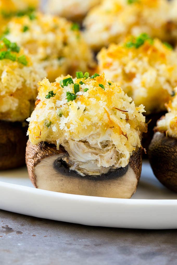 Crab Stuffed Mushrooms Recipe | Stuffed Mushrooms | Mushroom Appetizer #crab #seafood #mushrooms #lowcarb #appetizer #bajap A cross section of a crab stuffed mushroom.