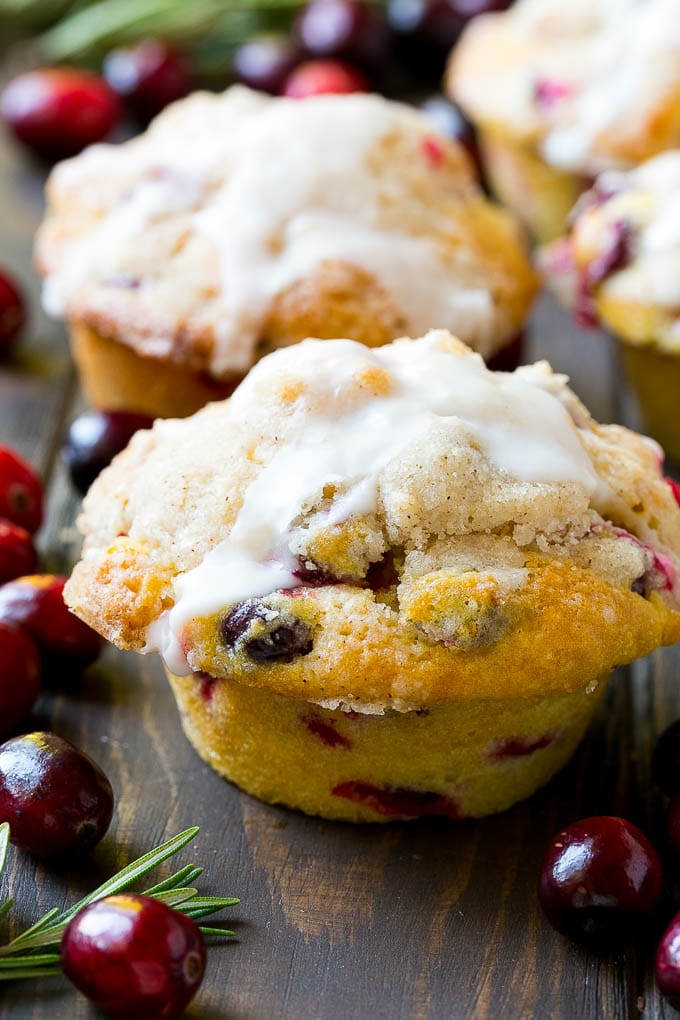 Cranberry Muffins Recipe | Cranberry Orange Muffins #cranberry #muffins #orange #fall #dessert #bajap Cranberry muffins topped with streusel and orange glaze.