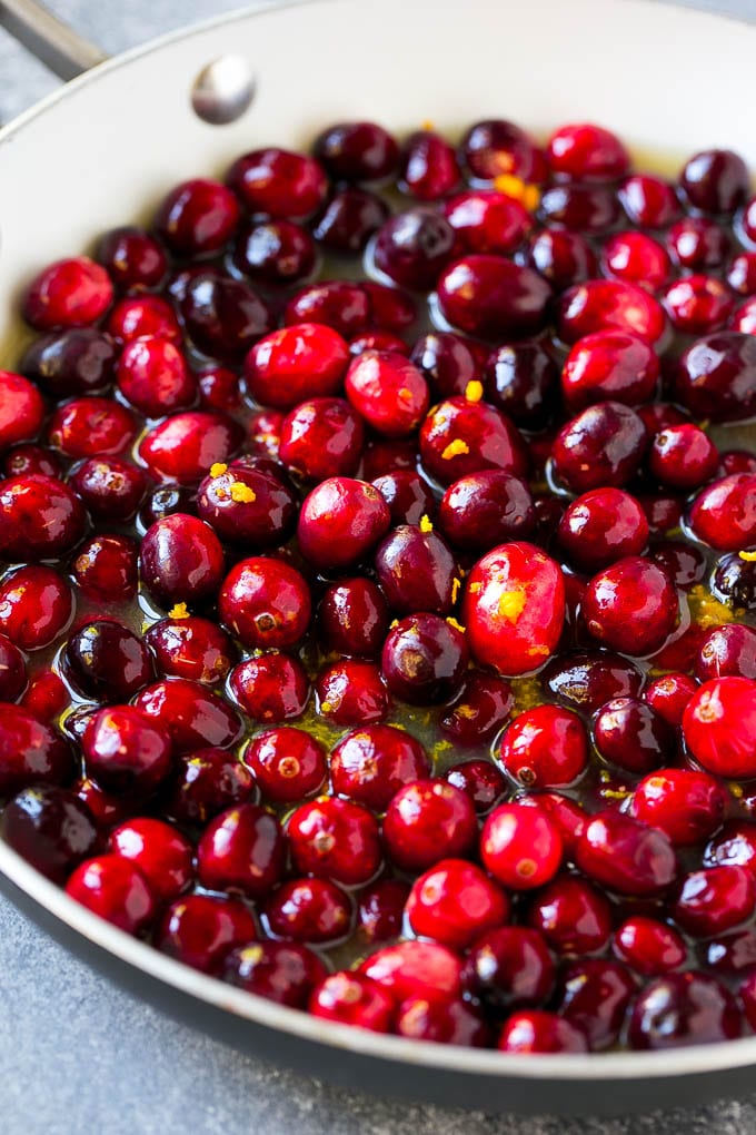 Cranberry Orange Sauce Recipe | Homemade Cranberry Sauce | Fresh Cranberry Sauce #cranberry #orange #fall #thanksgiving #sauce #dinner #bajap Berries in a skillet with orange juice, sugar and orange zest.