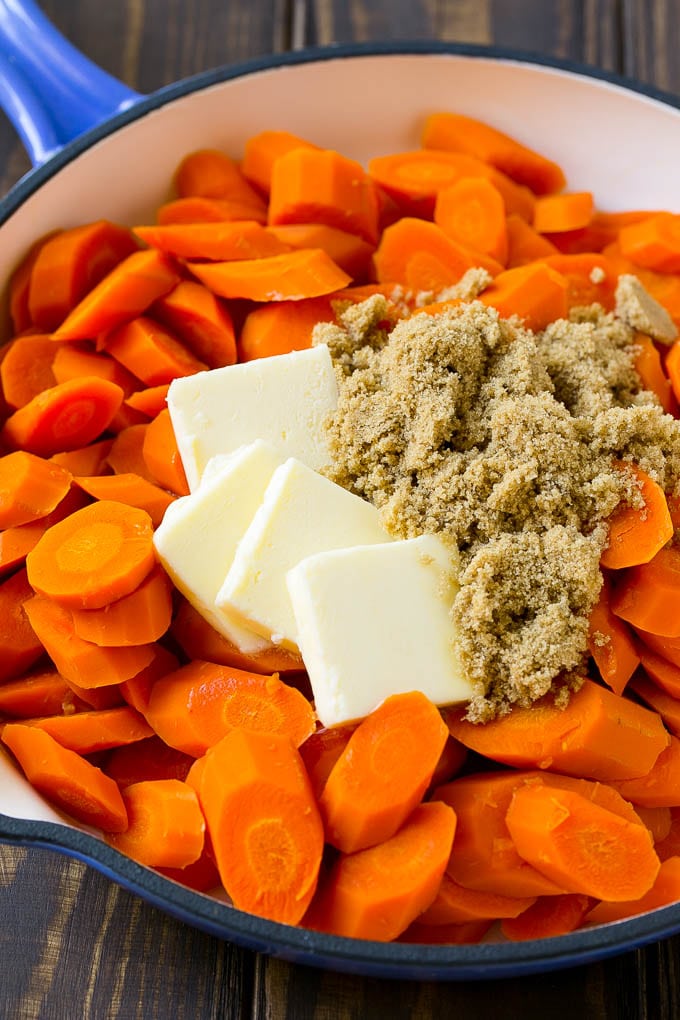 Glazed Carrots Recipe | Brown Sugar Carrots | Carrot Side Dish #carrots #brownsugar #sidedish #glutenfree #thanksgiving #fall #dinner #bajap Sliced cooked carrots with butter and brown sugar.