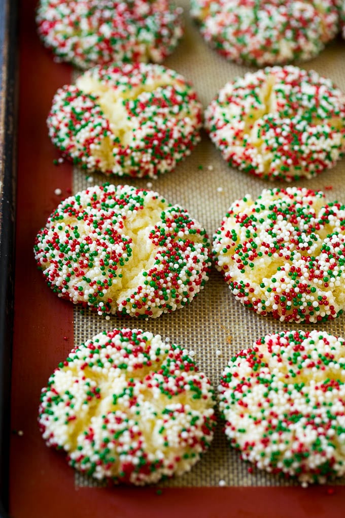 Gooey Butter Cookies Recipe | Cake Mix Cookies | Sprinkle Cookies | Christmas Cookies #cookies #butter #sprinkles #christmas #dessert #baking #bajap Baked gooey butter cookies on a sheet pan.