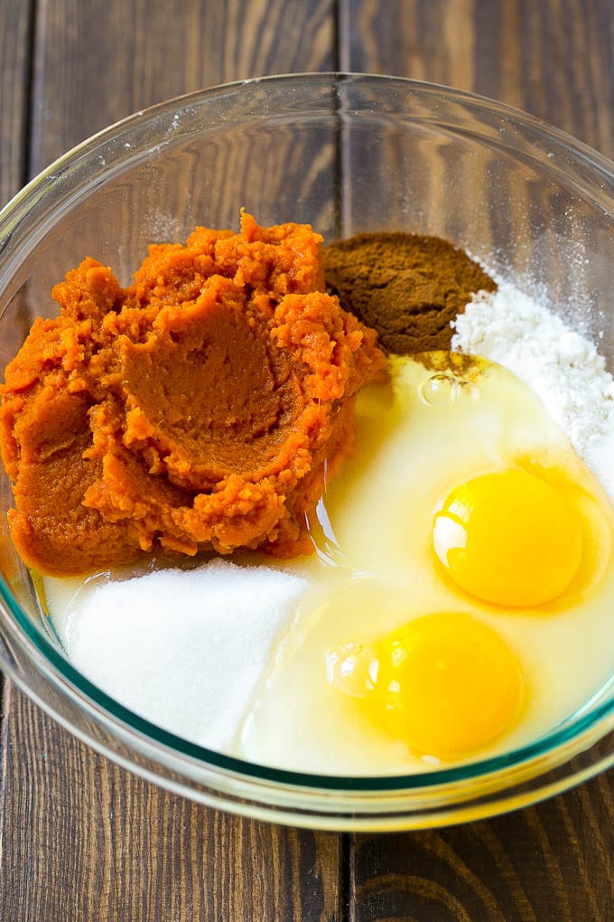 Pumpkin Chocolate Chip Bread Recipe | Pumpkin Bread | Chocolate Pumpkin Bread #pumpkin #bread #fall #chocolate #baking #dessert #bajap Sugar, eggs, pumpkin puree, flour and spices in a mixing bowl.