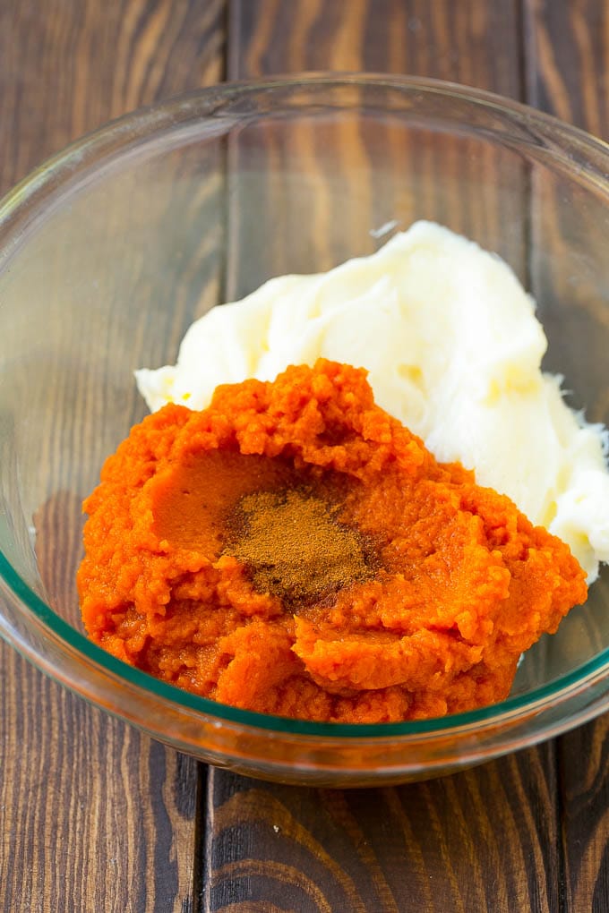 Pumpkin Dip Recipe | Dessert Dip | Pumpkin Pie Dip #pumpkin #dessert #dip #fall #thanksgiving #bajap Puree, cream cheese and spices in a bowl.
