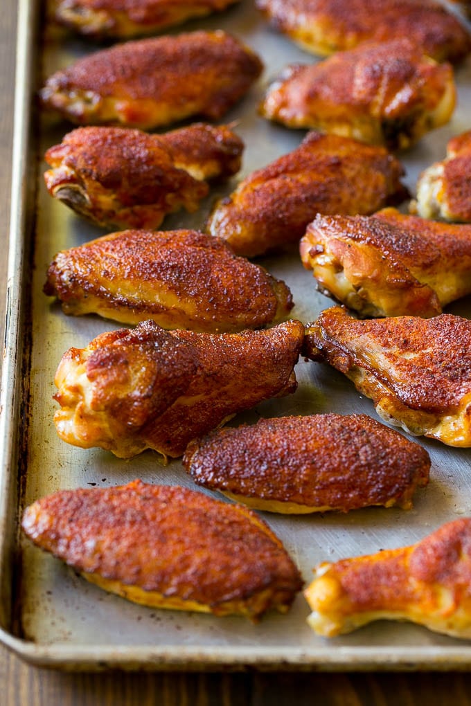 Smoked Chicken Wings | Barbecue Chicken Wings | BBQ Chicken Wings #chicken #wings #bbq #barbecue #appetizer #dinner #bajap Smoked chicken wings coated in spice rub on a sheet pan.
