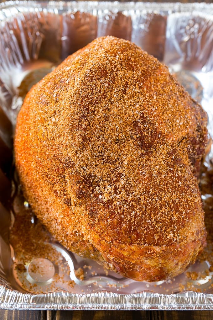 Brown Sugar Smoked Ham Recipe | Holiday Ham Recipe | Brown Sugar Glazed Ham #ham #christmas #thanksgiving #easter #smoker #dinner #brownsugar #bajap #glutenfree A ham crusted in homemade spice rub, ready to go into the smoker.
