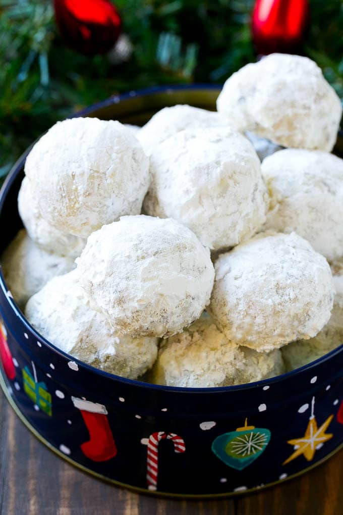 Snowball Cookies Recipe | Mexican Wedding Cookies | Russian Tea Cakes #cookies #pecan #chocolate #baking #dessert #christmas #bajap Snowball cookies coated in powdered sugar and served in a holiday tin,
