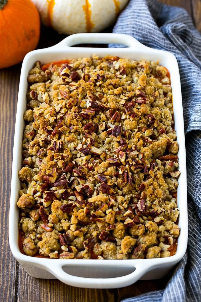 Sweet Potato Casserole with Pecans Recipe | Sweet Potato Casserole | Sweet Potato Side Dish #sweetpotatoes #thanksgiving #pecans #casserole #sidedish #holiday #fall #bajap Sweet potato casserole with pecans and brown sugar streusel in a baking dish.