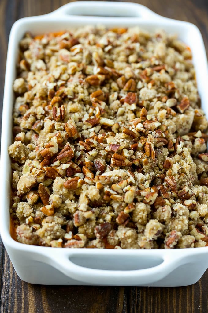 Sweet Potato Casserole with Pecans Recipe | Sweet Potato Casserole | Sweet Potato Side Dish #sweetpotatoes #thanksgiving #pecans #casserole #sidedish #holiday #fall #bajap An uncooked sweet potato casserole with pecan streusel.